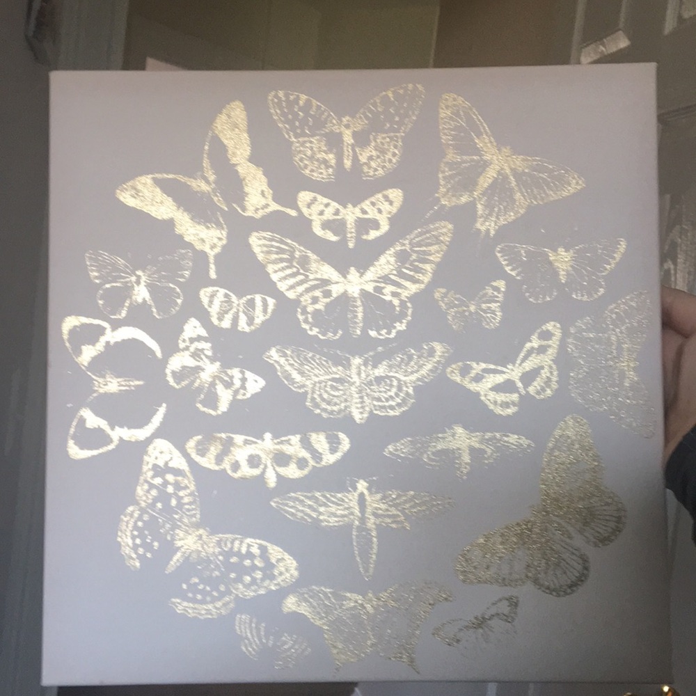 Cream and gold butterfly sign